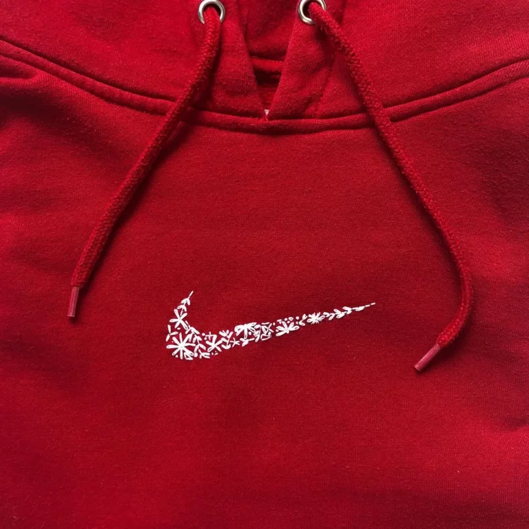 Nike logo on red sweatshirt